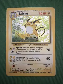 Pokemon Raichu Base Set Holo Rare 80 HP Card 14/102 1999 Wizards of the Coast - Image 1