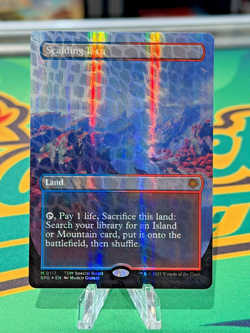 MTG Scalding Tarn Mythic 117 (Borderless) (Dragonscale Foil) Special Guests Foil - Image 1