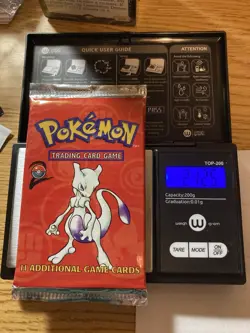 Wizards of the Coast Pokemon TCG Base Set 2 Pack HeavyUU 21.25g. Mewtwo Art 742818061698 - Image 1