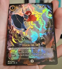 Disney Lorcana - "Touch the Sky" (ENCHANTED RARE) Wilds Unknown Merida 240/204 - Image 1