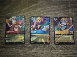 Lorcana Stitch, Rapunzel, and Donald Epcot Cards with Achazia's Island Trove - Image 1