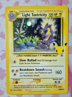 Light Toxtricity SWSH137 Ultra Rare Holo Celebrations Promo Pokemon Card - Image 1