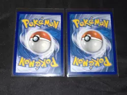 (2×) Pokemon Lost Thunder Celebi Prism Star 19/214 + Vivid Voltage Amazing 009 - Image 3