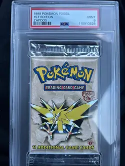 1999 Pokemon Fossil 1st Edition - PSA 9 Booster Pack Sealed - Zapdos - Image 1