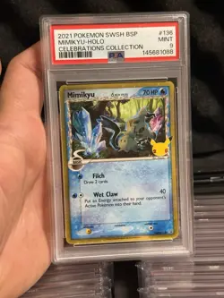 2021 Pokemon SWSH Black Star Promo Celebrations Mimikyu-Holo Card #136, PSA 9 - Image 1