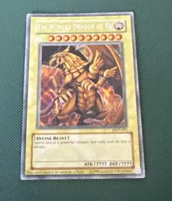 Yugioh The Winged Dragon of Ra DOD-001 Prismatic Secret Rare Yu-Gi-Oh! - Image 1