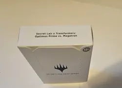 MTG Secret Lair x Transformers: Optimus Prime vs. Megatron NON-FOIL * SEALED * - Image 1