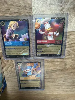 Rare!! EPCOT Lorcana Stitch, Rapunzel, Donald, Plus Sealed Illumineers Trove Box - Image 4