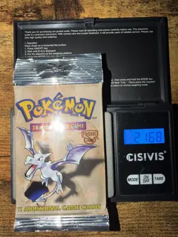 POKEMON FOSSIL BOOSTER PACK AERODACTYL SEALED 21.68g HEAVY - Image 1