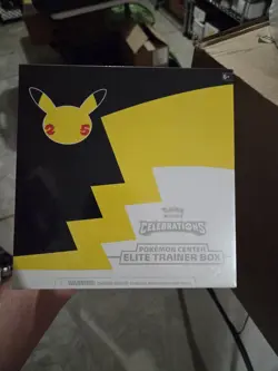 Celebrations Pokemon Center ETB with Protector Case Small Tear - Image 1
