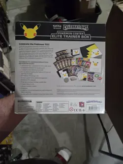 Celebrations Pokemon Center ETB with Protector Case Small Tear - Image 4