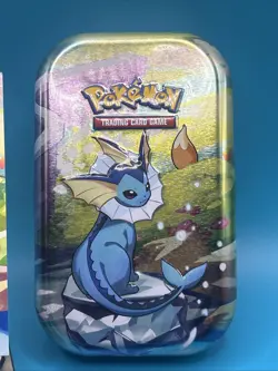 Vaporeon Prismatic Evolutions Mini Tin, Art card, and Coin Only - Image 3