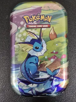 Pokemon Prismatic Evolutions Tin SEALED (VAPOREON) - Image 1