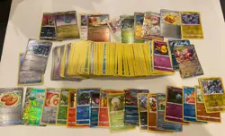 Random 200+ pokemon card lot, includes foils. - Image 1