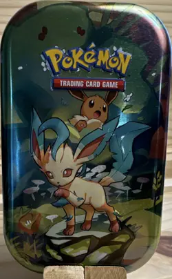 Pokemon Tin Scarlet & Violet Prismatic Evolutions Leafeon Eevee no packs - Image 1