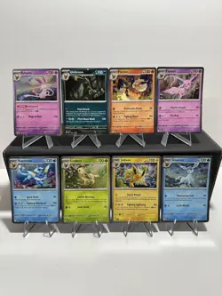 Pokemon Prismatic Cosmo Promo Cards (8) Mini Tin Evolutions Costco Pack - Image 2