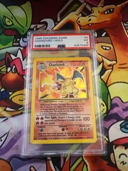 1999 POKEMON BASE SET UNLIMITED #4 CHARIZARD-HOLO PSA 5 - Image 1