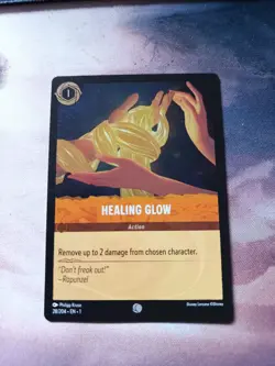28/204 HEALING GLOW THE FIRST CHAPTER COMMON DISNEY LORCANA CARD FOIL - Image 1