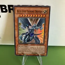 Blue-Eyes Shining Dragon MOV-EN001 Yu-Gi-Oh! The Dark Side of Dimensions LP - Image 1