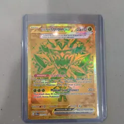 Teal Mask Ogerpon ex 177/131 Pokemon Prismatic Evolutions Gold Hyper Rare NM - Image 1
