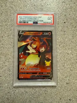 2021 POKEMON LANCE'S CHARIZARD V SWSH133 BLACK STAR PROMO 133 CELEBRATIONS PSA 9 - Image 1