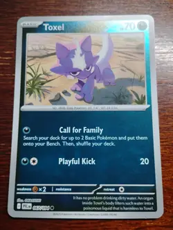 Toxel 067/094 Me02: Phantasmal Flames Reverse Holo pokemon card - Image 1