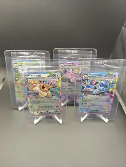 Prismatic Surprise Box Stamped Promos Lot Of 4 Sealed (Leaf, Esp, Gla, Eevee) - Image 1