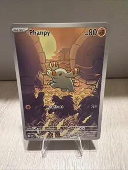 PHANPY 2024 POKEMON SURGING SPARKS ILLUSTRATION RARE 205/191 - Image 1