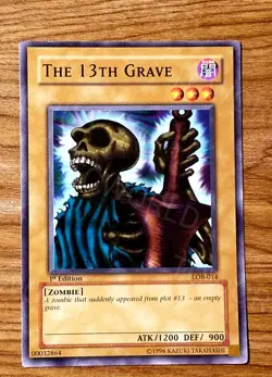 Yu-Gi-Oh! 1st Edition LOB-014 "The 13th Grave" NMint-Mint - Image 1