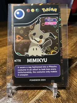 2024 Pokemon Pokedex Black Kanto #778 Mimikyu Gold Heart Holo - Image 1