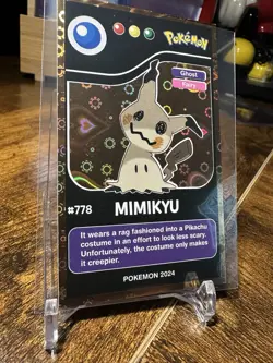 2024 Pokemon Pokedex Black Kanto #778 Mimikyu Gold Heart Holo - Image 3