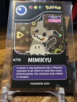 2024 Pokemon Pokedex Black Kanto #778 Mimikyu Gold Heart Holo - Image 4