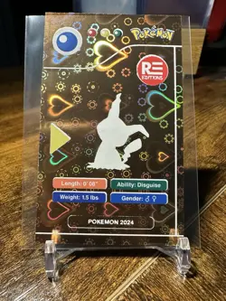 2024 Pokemon Pokedex Black Kanto #778 Mimikyu Gold Heart Holo - Image 5