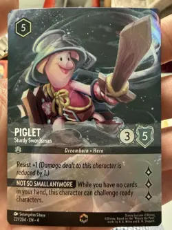 Disney Lorcana Piglet Sturdy Swordsman 221/204 | ENCHANTED | Ursula's Return - Image 1