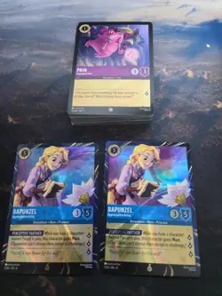 Two Disney Lorcana EPCOT Promo Rapunzel Appreciative Artist , with 48 extra card - Image 1