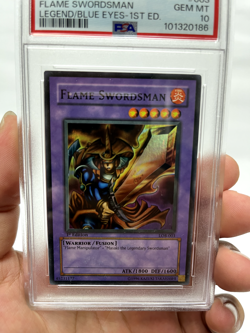 Yugioh PSA 10 2002 Flame Swordsman LOB-003 Super Rare 1st Edition WAVY - Image 1