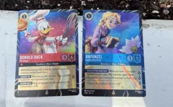 Disney Lorcana Magical Places Epcot 2026 Rapunzel & Donald Duck Promo Set Of 2 - Image 1