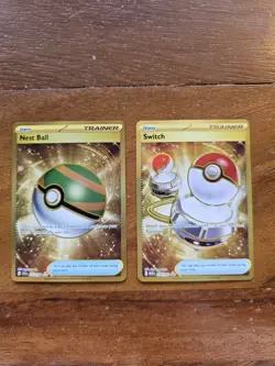 Pokemon Lot Of 2 Gold Nest Ball 255/198 And Switch 206/165 Triple Gold Star - Image 1