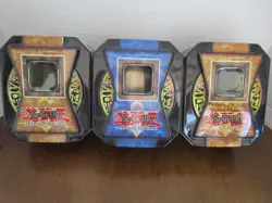 Three (3) Empty Yu-Gi-Oh! Trading Card Game Tins - 2 Gold - 1 Blue - Image 1