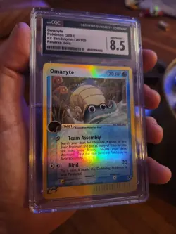 CGC 8.5 GEM MINT Pokemon 2003 Omanyte 70/100 Reverse Holo Ex Sandstorm - Image 1
