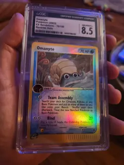 CGC 8.5 GEM MINT Pokemon 2003 Omanyte 70/100 Reverse Holo Ex Sandstorm - Image 2