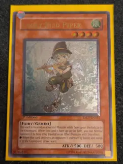 Yugioh Lucky Pied Piper TAEV-EN021 1st Edition Ultimate Rare - Image 1