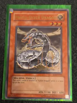 SOI-EN010 Proto-Cyber Dragon Ultimate Rare Unlimited Edition NM Yugioh Card - Image 1