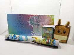Prismatic Evolutions SPC Play Mat, Eevee Deck Box, Card Sleeves - ** No Packs** - Image 1