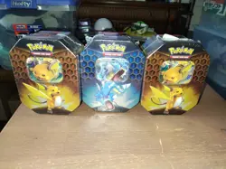 Lot Of 3 Pokemon TCG Hidden Fates Tins, 2 Raichu GX Tins, 1 Gyarados GX - Sealed - Image 1