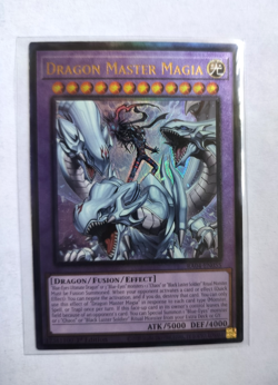 Dragon Master Magia (PUR) RA04-EN055 Yugioh Quarter Century Stampede 1st Edition - Image 1