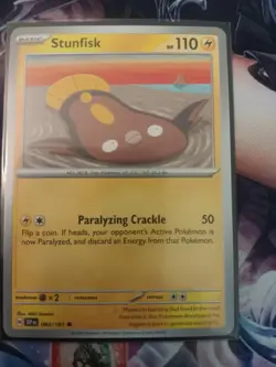 Stunfisk 064/191 Common Surging Sparks Pokemon Near Mint - Image 1