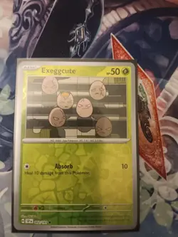 Exeggcute 002/191 Common Surging Sparks Pokemon Reverse Holo Near Mint - Image 1