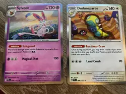 Pokemon TCG Prismatic Evolution Sylveon and Dundunsparce print error ink bleed - Image 1