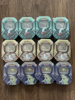 Pokemon TCG Triple Whammy Tins - 12 Factory Sealed 36 Booster Packs total - Image 1